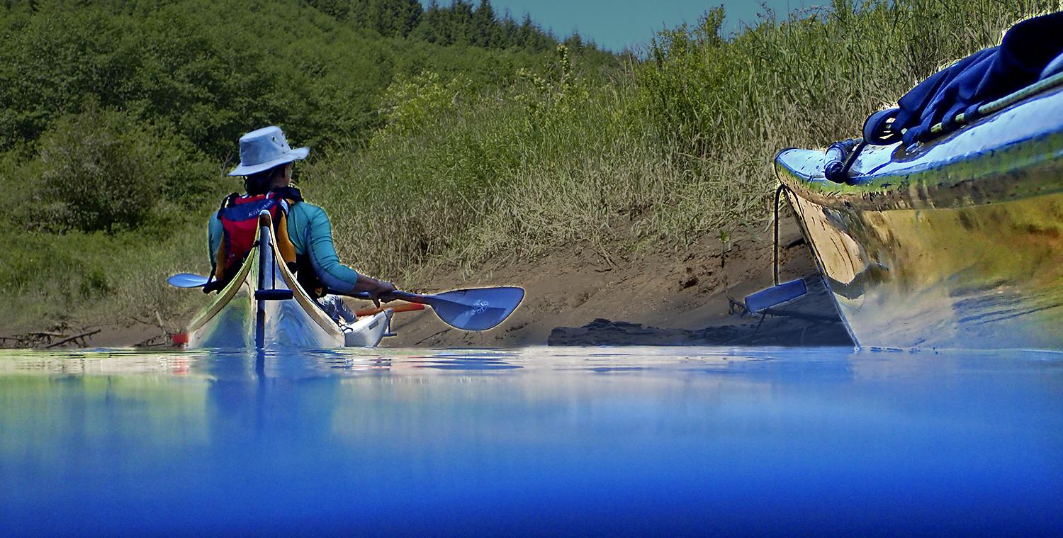 artistic shot of a kayaker from water level